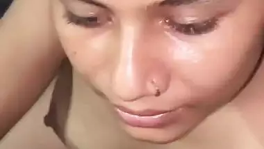 Young girl strips and sucks a dick in desi porn