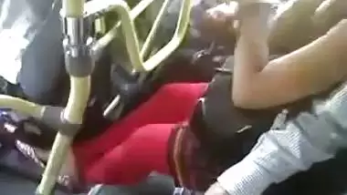 Man touching the boobs of a girl in the bus