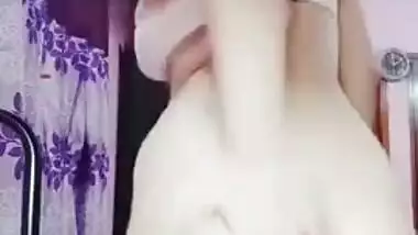 Nerdy college girl from India shakes big buttocks and spanks it