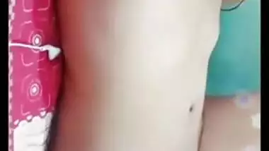 Desi gal grabs camera in time to record how she rubs own XXX pussy